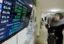 Курс доллара на Московской бирже упал ниже 77 рублей