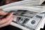 ЦБ РФ снизил на 16 августа курс доллара до 64,21 рубля, курс евро повысил до 71,73 рубля